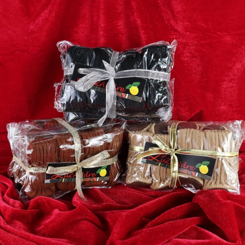 Three gift wrapped packs of chair leg floor protectors, one beige, one brown and one black.