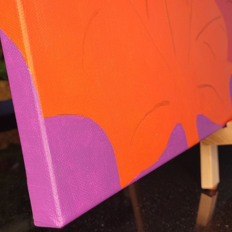 Angled close-up view of original acrylic maple leaf painting