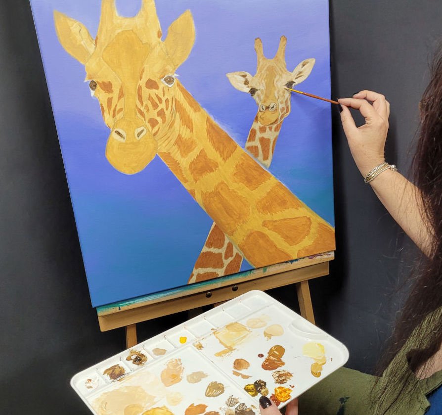 Nanda painting two giraffe