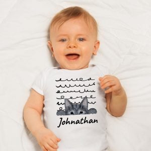 Baby wearing a white summer bodysuit with a grey cat design and the name "Johnathan" which is optional to personalize with your baby's name.