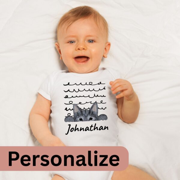 Cat Grey Scribbles Personalize baby onsie on baby with customizable name Baby wearing a white summer bodysuit with a grey cat design and the name "Johnathan" which is optional to personalize with your baby's name.