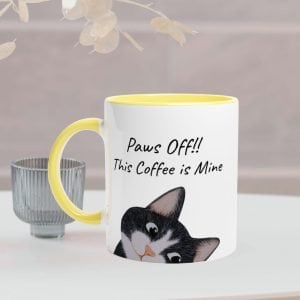 This white mug has a yellow handel and inside. It has a black cat design and text on the front sides of the mug. It is optional to personalize only the text on the mug.