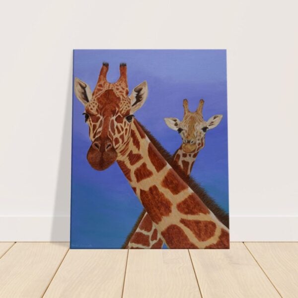 Canvas print of a mother and youngster giraffe with a blue background.
