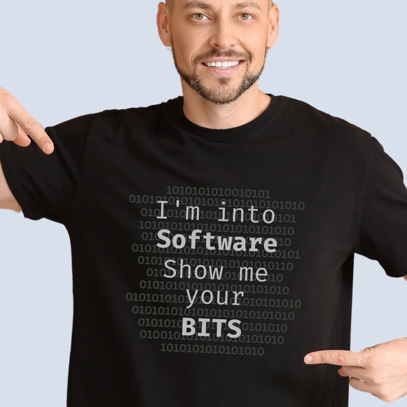A man wearing a black t-shirt with the text "I'm into Software, Show me your bits".