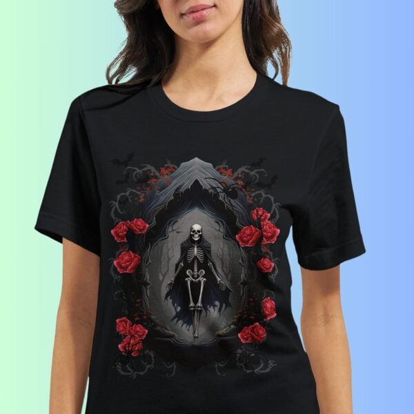 A woman wearing a black gothic skeleton t-shirt featuring red roses, bats, and spiders.