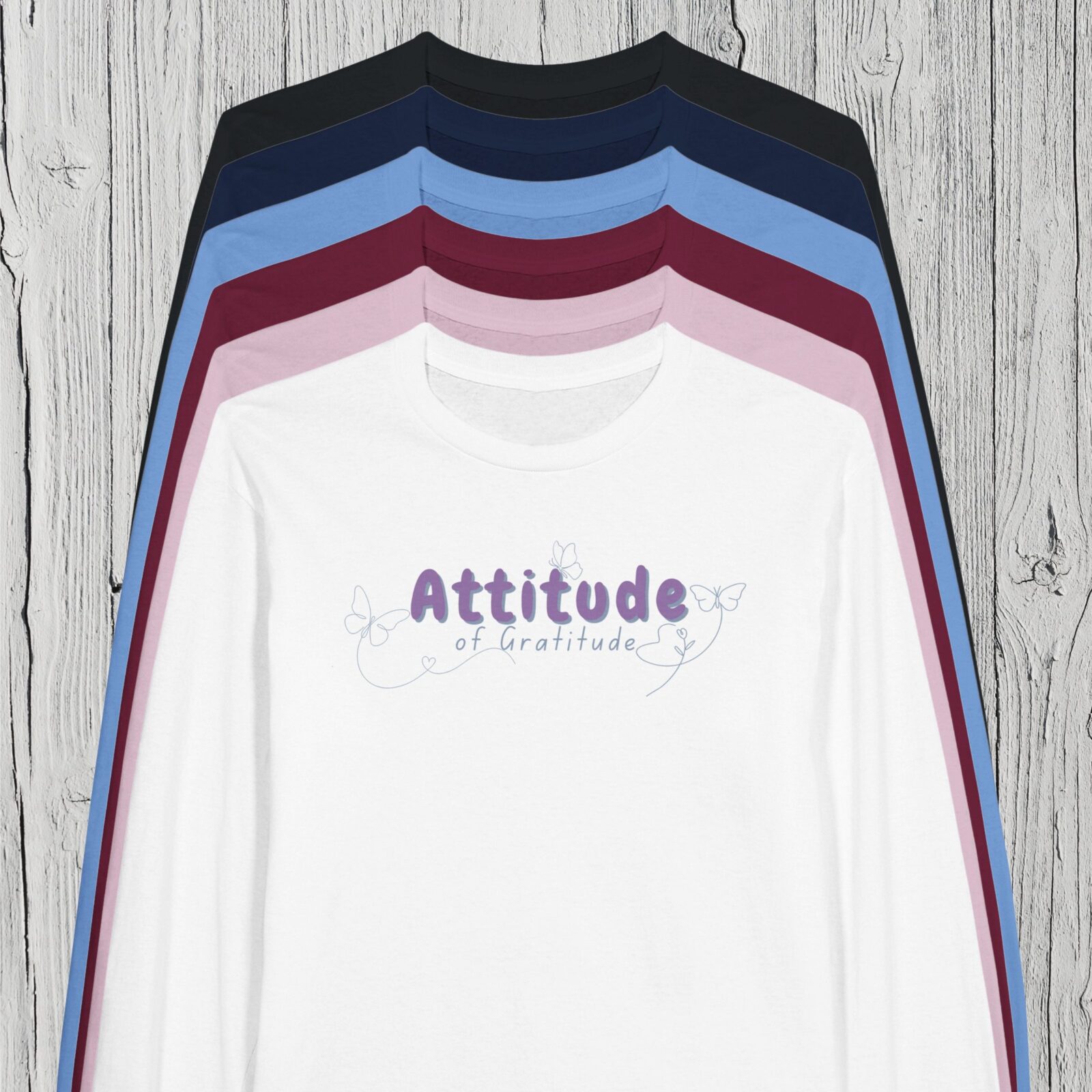 There are 6 colour options for the t-shirt: black, navy, Carolina blue, maroon, light pink and white.