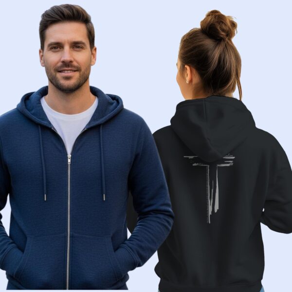 A woman wearing a black zip hoodie with a cross design printed on the back. This Christian Cross design includes the text "Salvation" and quote Galatians 3:11. The second man is wearing a navy zip hoodie, showing the front of the hoodie which has no print on the front.