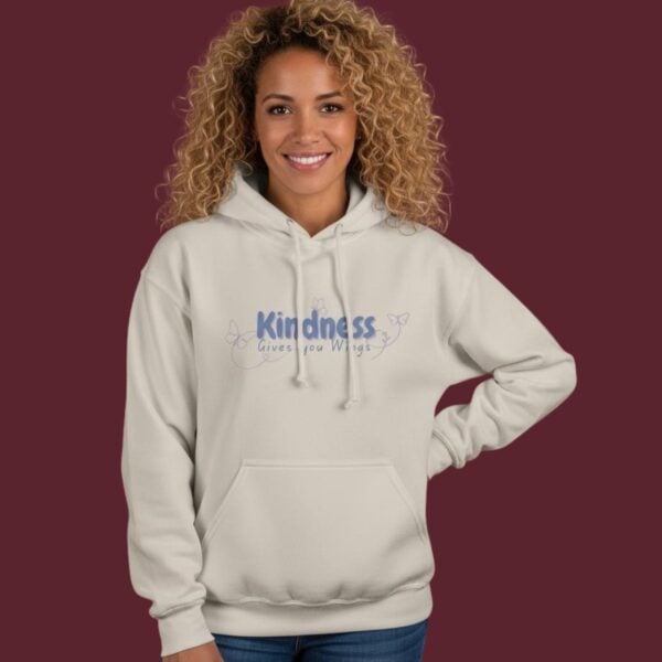 A woman wearing a hoodie with the text "Kindness gives you wings"