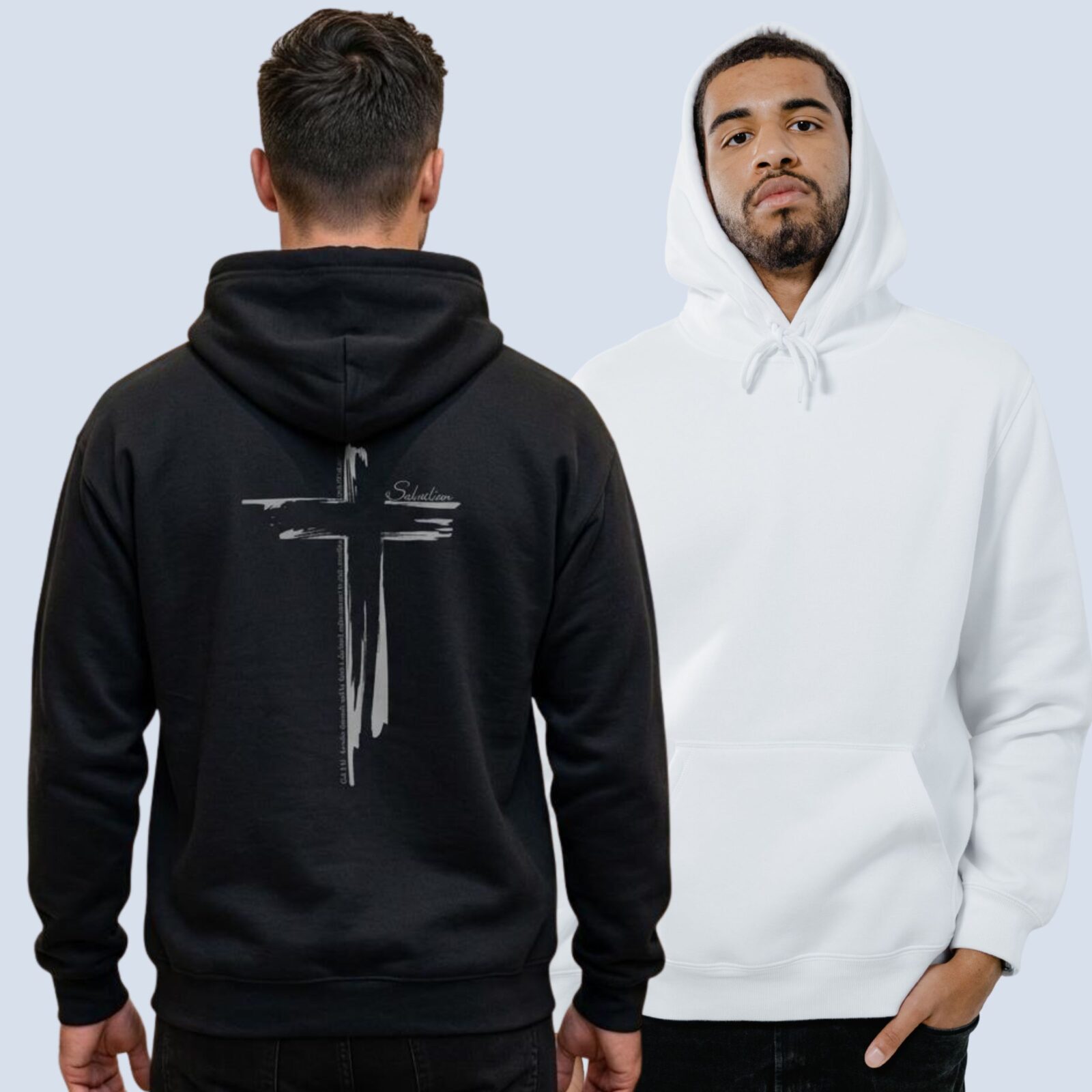A man wearing a black pullover hoodie with a cross design printed on the back. This Christian Cross design includes the text "Salvation" and quote Galatians 3:11. The second man is wearing a white pullover hoodie, showing the front of the hoodie which has no print on the front.