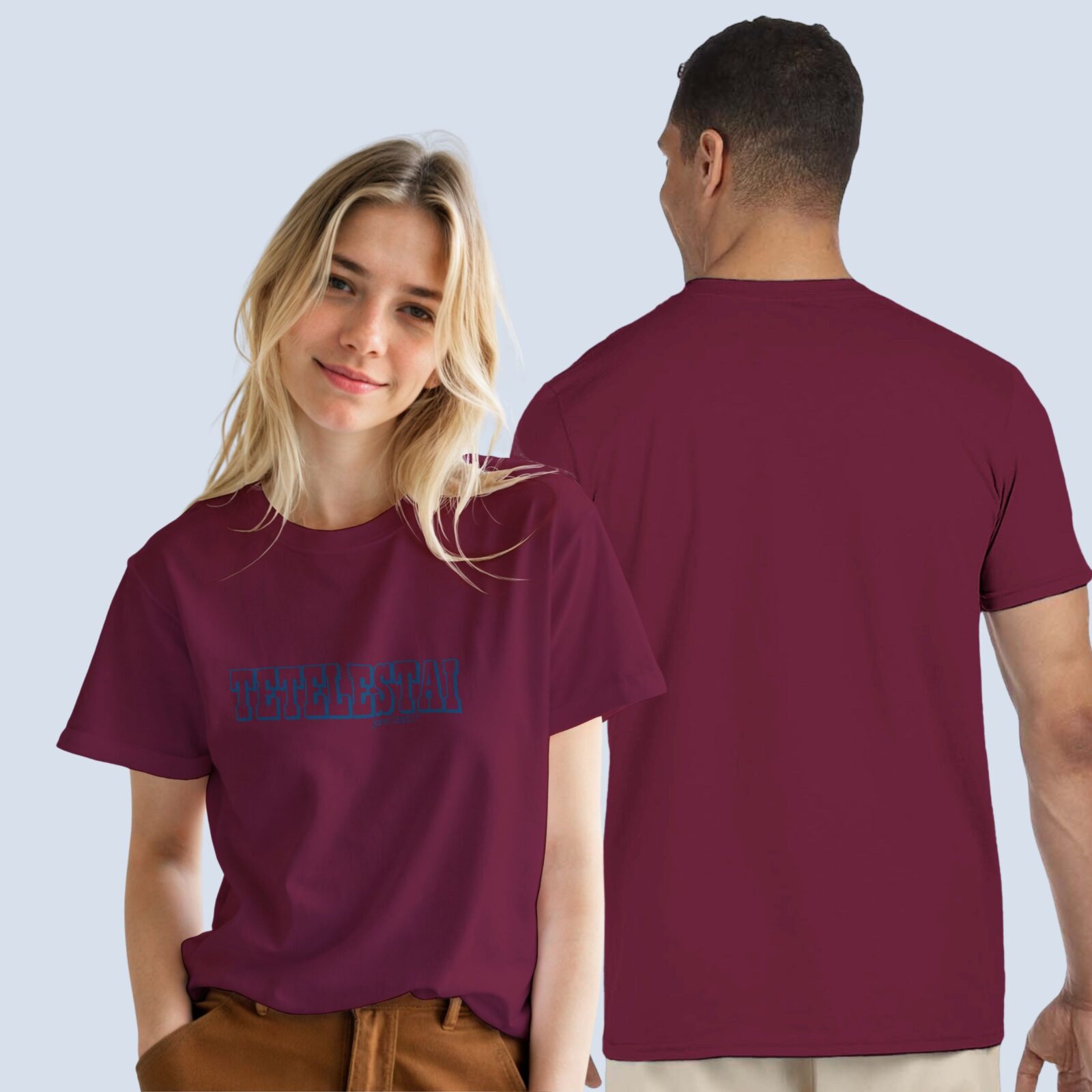 A man and a woman wearing a maroon unisex t-shirt with the text "Tetelestai, John 19:30". Front and back view of the t-shirt. The design is printed on the front of the t-shirt only.
