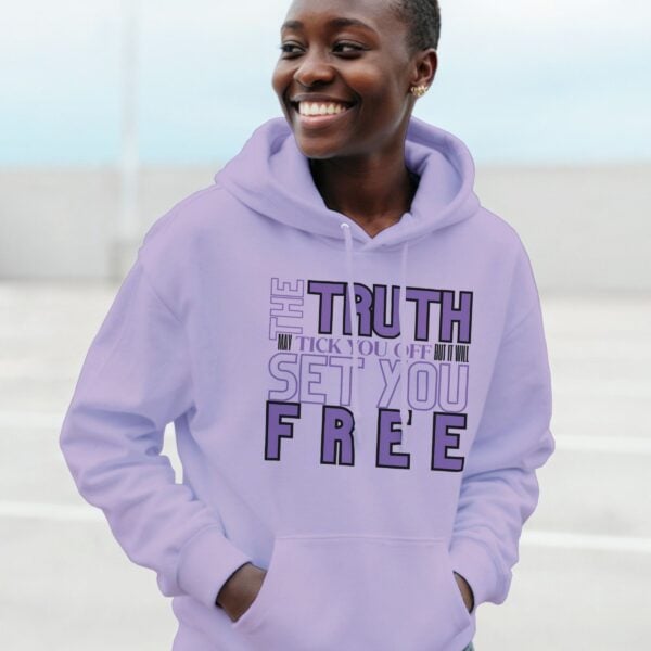 Truth Pullover Hoodie Woman Front A woman wearing a orchid purple unisex pullover hoodie with the text "The Truth may tick you off, but it Will Set You Free".