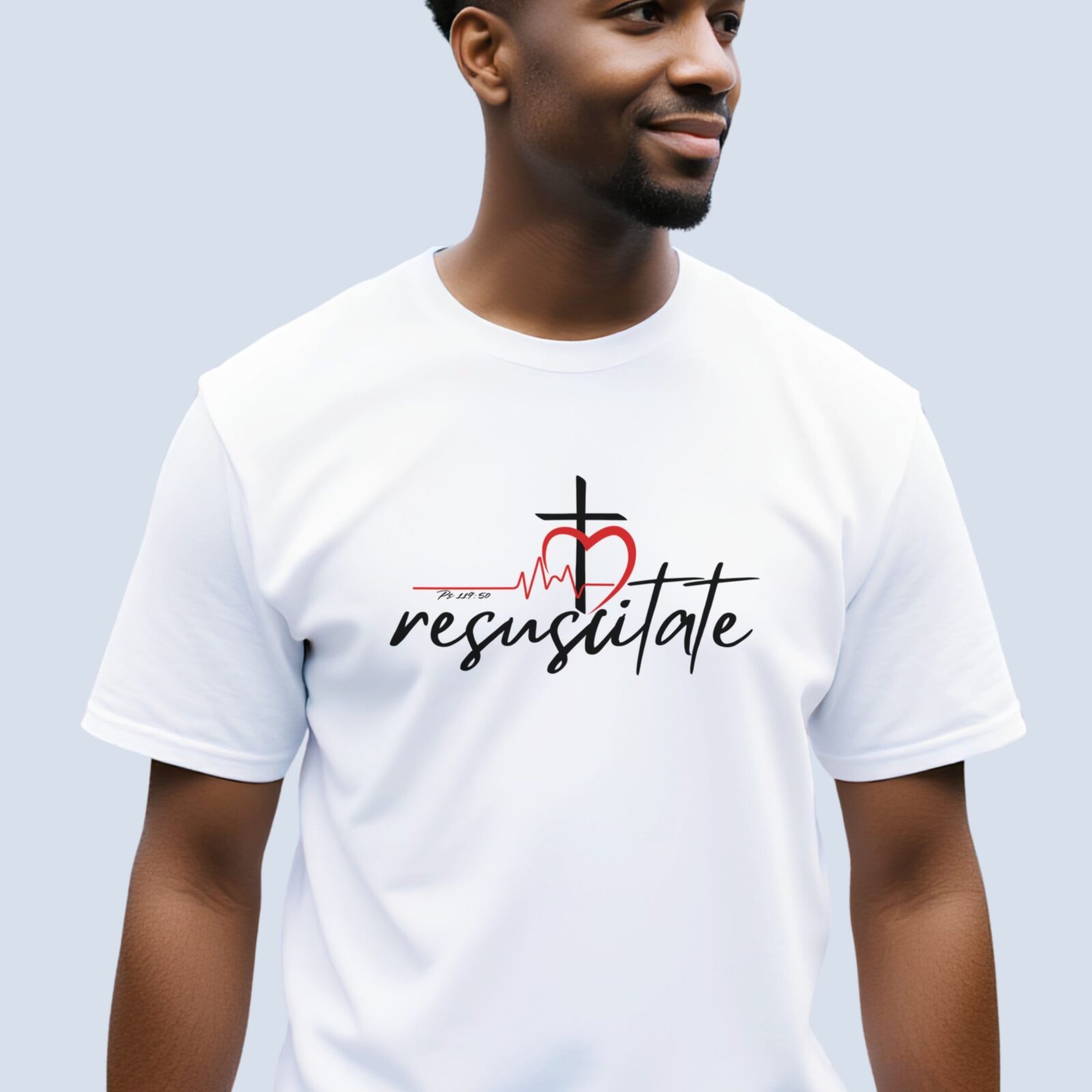 A man wearing a white Christian t shirt with the word "Resuscitate", featuring a heart and cross design. This Bible Verse Shirt is referencing Psalm 119:50.