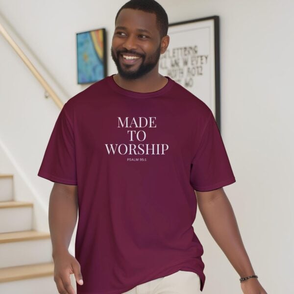 Made to Worship Tshirt Man on stairs A man wearing a maroon unisex Christian t-shirt featuring the powerful words “Made to Worship” and "Psalm 95:1", printed on the front of the t-shirt. It is a soft faith-based tee with inspirational design perfect for church, gifts, and everyday wear.